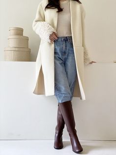 Editor's Notes The long boots with a moderate middle height accentuated the backline to accentuate the style- Modern and sophisticated mood- Soft and bold rounded toe- Chic and casual style- Comfortable feeling Measurements(in.)- Size : KR 225 ~ 255mm / US 5.5 ~ 8.5- Heel : 1.197in.- Body height : 14.57 in.- Entrance circumference : 14.17 in.- Calf circumference : 14.37 in.Composition & Care- Cowhide - Natural leather could have fine scratches and wrinkles- Avoid direct heat a Elegant Beige Knee-high Boots For Fall, Elegant Winter Mid-calf Boots, Chic Knee-high Boots With Round Toe For Winter, Chic Beige Knee-high Boots For Fall, Classic Winter Mid-calf Boots, Chic Mid-calf Heeled Boots For Winter, Elegant Knee-high Boots For Winter, Mid-calf Knee-high Boots For Winter Workwear, Beige Mid-calf Heeled Boots For Fall