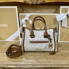 Michael Kors Small Messenger Handbag Nwt No Flaws Color Is Vanilla And Brown Nylon Interior Adjustable Strap Size Is 8”L X 3.5”W X 6”H Authentic Luxury Bags With Detachable Strap In Neutral Color, Luxury Bag With Detachable Strap In Neutral Color, Michael Kors Satchel With Detachable Strap In Coated Canvas, Cream Satchel Shoulder Bag In Coated Canvas, Cream Coated Canvas Satchel Shoulder Bag, Beige Coated Canvas Satchel With Handles, Beige Coated Canvas Bag With Handles, Beige Coated Canvas Bags With Handles, Beige Top Handle Bag In Coated Canvas