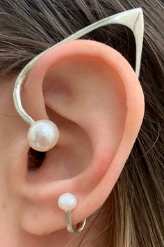 A subtle Elvin flair, lighter than the original Elvin Ear with the added elegance of freshwater pearls hugging your ear. So comfortable and light you will forget you are wearing it. Comes with one ear cuff, for both please order a “right” and “left” ear. 💕 This piece is MADE TO ORDER by our in-house designer and owner, for up to date lead times please check the top of the collection page. If you would like to request priority for a special occasion please email info@stonehartjewelry.com, we can Geode Necklace, Contemporary Jewelry Design, Face Jewellery, Geek Jewelry, Light Weight Jewelry, Gold Ear Cuff, Silver Ear Cuff, Fantasy Jewelry, Star Studs