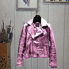 Shop This Metallic Pink Leather Jacket - Shiny Moto Biker Jacket for Women & Men - Genuine Leather, 7 Colors Looking for a stylish and trendy jacket that can make you stand out? Look no further than our Metallic Pink Leather Jacket! Crafted from genuine leather, this Pink jacket features a shiny metallic coat that is sure to turn heads.The moto style, lapel collar, and belted waist give it a bold and fashionable look that is perfect for both men and women. Please review all product details, incl Pink Motorcycle Jacket, Trendy Winter Biker Jacket For Motorcycling, Pink Punk Biker Jacket For Winter, Pink Winter Biker Jacket, Winter Pink Biker Jacket, Meg Costume, Pink Motorcycle, Pink Leather Jacket, Moto Biker Jacket