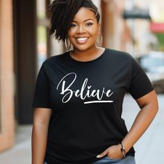 This classic unisex jersey short sleeve fits like a well-loved favorite. Users fall in love with it over and over again because of the soft cotton and high-quality print. Enjoy this print while you style in this shirt created just for you. Continue to believe and trust God in all things. All things are possible to those that believe. So enjoy this shirt, which is also a great gift for mom, sister, aunt, co-workers, and friends.   --Bella And Canvas is a Unisex shirt  --Please note we cannot exch Christmas Short Sleeve T-shirt With Text Print, Christmas Text Print Short Sleeve T-shirt, Black Christmas Tops With Text Print, Black Tops With Text Print For Christmas, Black Text Print Top For Christmas, Black Christmas T-shirt With Short Sleeves, Black Short Sleeve Christmas T-shirt, Christian Tees, Great Gifts For Mom