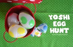 yoshi egg hunt in a red bucket on a green table