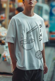 This Japanese Ramen T-Shirt features a retro noodles bowl graphic in cute Kawaii style, making it a perfect gift for foodies and Japan lovers. The anime design gives off a fun and vibrant vibe, suitable for casual wear or as a statement piece. Ideal for those who appreciate Japanese culture and enjoy unique and quirky fashion. Perfect for birthdays, Christmas, or any occasion for food lovers and anime enthusiasts. Product features - Shoulder tape for stability - Tubular knit without side seams - Noodles Bowl, Japanese Ramen, Style Kawaii, Style Anime, Kawaii Style, Anime Design, Quirky Fashion, Noodle Bowls, Foodie Gifts