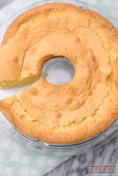 a bundt cake with a bite taken out of it sitting on top of a table