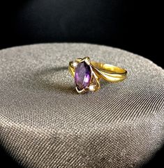 My Collection of Vintage rings from the Late 70's I have collected various rings over the years, but i think its time to share them with all of you!  RING INFO. * Size - 6 * .85 Carat Amethyst Natural Stone * 2 Diamonds are .05 Carat each  NOT YOUR SIZE? ›This ring can be resized to size 5, 7 or 8  ›Resizing this ring is included in the purchase price. On purchase, make sure to include the size you want it.  CUSTOMIZATION If this is a ring you like but you want to make it your own, contact me to Irish Earrings, Amethyst Ring Vintage, Diamond Ring Vintage, February Birthstone Jewelry, Tropical Earrings, Pineapple Earrings, Vintage Cocktail Ring, Amethyst And Diamond Ring, Amethyst Gold