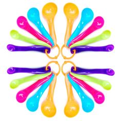 six plastic spoons with colored handles arranged in a circle on top of each other