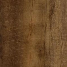 a wooden surface that looks like it has been stained with dark brown paint and wood grains