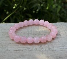 Natural Rose Quartz Bead Bracelet Bead Size : 8 MM In our shop all items are Handmade. You want to make customise! yes, we would love to. We have very good collection of Crystals Metaphysical and Gemstone as well, please message us for any requirements. Please bare in mind due to the current pandemic, delivery times maybe delayed. if there is a delay please do reach out to us. Thank you for your prestigious time. Rose Quartz Beaded Bracelets As Gift, Handmade Rose Quartz Beaded Bracelets, Handmade Beaded Bracelets With Rose Quartz, Handmade Rose Quartz Crystal Bracelet With Round Beads, Handmade Rose Quartz Beads Crystal Bracelet, Buddha Bracelet Beads, Rose Quartz Bracelet Beads, Girly Bracelets, Black Tourmaline Bracelet