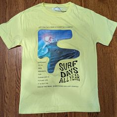 Big Kids Zara Surf T-Shirt With Raised Graphic & Text. So Cool! Size 13/14. You Can Feel The Soft Squishy, Protruding Graphic And Text. This Is A Unique Tee And Fun Find! Yellow Short Sleeve T-shirt With Text Print, Yellow Crew Neck T-shirt With Logo Print, Yellow Graphic Print T-shirt For Summer, Summer Yellow Graphic Print T-shirt, Yellow Crew Neck T-shirt With Text Print, Casual Yellow T-shirt With Letter Print, Yellow Cotton Tops With Logo Print, Fun Yellow T-shirt With Letter Print, Yellow Summer T-shirt With Screen Print