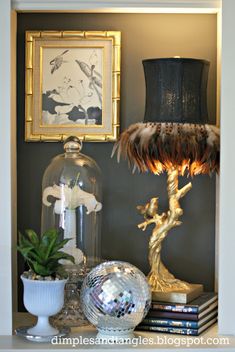 a lamp and some books on a shelf