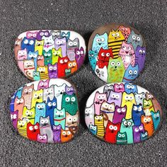 three rocks with different colored cats on them and the letters abc, b, c