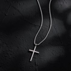 Wear your faith proudly with this men's cross necklace. This beautiful statement piece is crafted in sterling silver with 14k white gold plating and sits on a sturdy 24-inch gold plated stainless steel chain. The Paved Cubic Zirconia stone cross necklace for him showcases your faith and belief. It adds protection and a unique look to your wardrobe. Discover all our sleek 925 silver jewelry for men and find a gift for him HERE Made with white gold plated 925 sterling silver. Color: White Dimensio Silver Cross Pendant Necklace For Father's Day, Father's Day Silver Cross Pendant Necklace, White Gold Cross Pendant With Box Chain, Sterling Silver Cross Necklace With Box Chain, Silver Cross Necklace With Box Chain, Silver Crucifix Cross Necklace With Box Chain, Silver Jewelry For Men, Necklace For Him, Polished Man