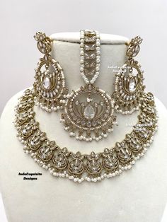 Gorgeous white Polki antique gold Necklace Set comes with elegant earrings and tikka / Indian Jewelry/ High Quality Kundan and Polki Jewelry/ Bollywood Jewelry/Wedding Jewelry All items are shipped from Brampton, Ontario, Canada. If you need your item by a certain day, please reach out to us for express delivery option before placing the order so that we can update the shipping for you. Standard shipping/delivery timeline Below are the estimated delivery times after the order is shipped/dispatch Heavy White Chandbalis For Reception, White Chandbali Tikka With Intricate Design, White Hand-set Chandbalis For Wedding, White Hand Set Chandbalis For Wedding, White Kundan Chandbalis For Wedding, White Tikka With Intricate Design For Wedding, Wedding White Hand Set Chandbalis, White Tikka With Intricate Design For Diwali, White Intricate Design Tikka For Diwali