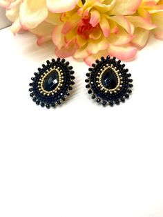 Black stud earrings Made to order  Customized and designed exclusively by me.  Measurement: 1.5inches * 1.5 inches Materials: seed beads, cabochons, backing faux leather, fingernail post Color: Black and gold The earrings will be ready for shipment within 3-5 days! Very often however I manage to have them ready for shipment in a much shorter time! MORE EARRINGS HERE: https://www.etsy.com/shop/Dodojewelrydesign?ref=simple-shop-header-name&listing_id=1019240339 Black teardrop beaded earrings, statement jewelry, unique holiday gifts Why order from Dodojewelrydesign? Meaningful and timeless jewelry that you can wear every day. -with an average 5-star review rating -all items are handmade from raw materials with care and attention to detail. My policies: https://www.etsy.com/shop/dodojewelrydes Handmade Black Teardrop Earrings For Party, Black Beaded Teardrop Earrings For Gift, Teardrop Black Beaded Earrings For Gift, Teardrop Earrings With Black Beads For Gifts, Teardrop Black Bead Jewelry Gift, Teardrop Black Beaded Earrings As Gift, Teardrop Black Beads Jewelry Gift, Teardrop Black Beads Jewelry As Gift, Teardrop Black Beaded Jewelry For Gift