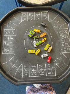 a black tray with cars on it