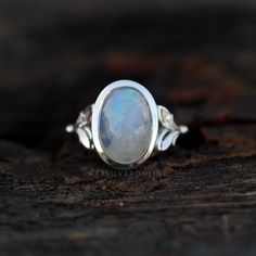 Rainbow Moonstone Ring, Moonstone Silver Ring, 925 Sterling Silver Ring, June Birthstone Ring, Women Ring, Gift For Her, Anniversary Gift Metal: 925 Sterling Silver Gemstone : Natural Moonstone Stone Color : White Stone Shape : Oval Stone Setting: Bezel Benefits of wearing Rainbow Moonstone :- The Blue Turquoise can help you strike the right balance in your emotional state too, by being an efficient healer and ensuring the well-being of your body and mind. Holding or wearing this gemstone can al Sterling Silver Moonstone Ring Shaped Like Moon For Promise, Sterling Silver Moonstone Ring In Moon Shape, Sterling Silver Moonstone Ring In Moon Shape For Promise, Moon Shaped Moonstone Ring In Sterling Silver, Silver Sterling Silver Moon Shaped Opal Ring, Sterling Silver Oval Rings With Moon Phase, Sterling Silver Oval Rings With Moon Phase Detail, Mystical Moon-shaped Moonstone Ring In Sterling Silver, Moon Shaped Opal Ring In Sterling Silver