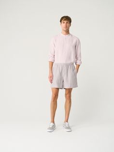 "Easily the comfiest linen shorts out there. Offered in medium-weight linen. If you're interested in a longer & bit more chic shorts option, check our men's shorts LIMA.  STYLE DETAILS * Regular fit * Elasticated waist * No closure * 2 side pockets * Mini length * Made from medium-weight linen SIZES & COLORS IN PICTURES * Model wears size M in color Pearl Grey. He is 188 cm (6'2\"). Chest - 97 cm (38\"), waist - 83 cm (33\"), hips - 97 cm (38\"). NOTES ON SIZING & COLORS * Please note that linen shrinkage during the softening process cannot be predicted precisely. Therefore, each piece in the same size can vary 1-2 cm. * The actual color may be slightly different due to screen settings. If the exact color is important to you, we advise ordering the Color Guide. MAKE-TO-ORDER / CUSTOMIZATIO Linen Bermuda Shorts With Built-in Shorts And Relaxed Fit, Relaxed Fit Linen Shorts For Vacation, Relaxed Fit Linen Bermuda Shorts With Built-in Shorts, Linen Bermuda Shorts For Summer, Linen Bermuda Shorts For Loungewear, Bermuda Linen Shorts For Loungewear, Relaxed Fit Flax Bottoms For Summer, Summer Relaxed Fit Flax Bottoms, Summer Linen Bermuda Shorts With Elastic Waistband