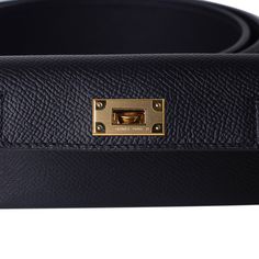 Guaranteed authentic Hermes Kelly Pocket Shoulder Strap featured in Black.The strap has a card holder with a Kelly turn key clasp.Gold hardware. Strap is Swift leather and card case is Epsom leather.Comes with sleeper and signature Hermes box.New or Pristine Store Fresh Condition.Listing is for the strap only.final saleSTRAP MEASURES:44" X 2"CONDITION:New or Pristine Store Fresh Condition Luxury Travel Wallets With Gold-tone Hardware, Classic Rectangular Wallet With Gold-tone Hardware, Classic Rectangular Wallets With Gold-tone Hardware, Luxury Leather Wallets With Gold-tone Hardware, Luxury Wallets With Gold-tone Hardware For Everyday Use, Luxury Wallets With Interior Card Slots For Business, Luxury Business Wallets With Interior Card Slots, Luxury Bags With Card Slots For Business, Luxury Business Bags With Card Slots