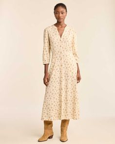 This long, button-front dress features a floral print inspired by vintage American calico prints from the late 1800s, in a linen/rayon blend that's perfect as the seasons change. With gently gathered sleeves, gathered waist, and a fuller skirt. Machine wash. 55% linen/45% rayon. Imported. | WOMEN'S FLORAL BUTTON-FRONT LANA DRESS Viscose Day Dresses With Buttons, Viscose Daywear Dresses With Buttons, Viscose Dresses With Buttons For Daywear, Spring Viscose Dress With Buttons, Rayon Midi Dress With Buttons For Daywear, Buttoned Midi Dress For Daywear, Daywear Button Closure Rayon Midi Dress, Rayon Midi Dress With Button Closure For Daywear, Rayon Day Dresses With Button Closure