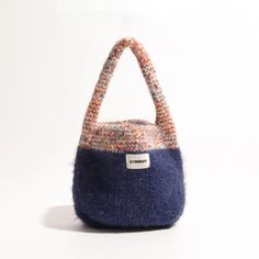 Add a touch of coziness to your style with the Multicolor Knitted Bucket Bag. The soft-touch knit material and plush texture make it a perfect handbag for casual and comfy occasions. Soft touch knit material Plush texture Handbag Size: length 16cm (6.2inc) width 5cm (1.9inc) height 20cm (7.8inc) Strap size: height 14cm (5.5inc) Kitsch Fashion, Vest Style Women, Green Contacts Lenses, Purple Contacts, Egirl Fashion, Crop Pullover, Hip Hop Fashion 90s, Y2k Summer Outfits, Y2k Necklace