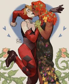 two women dressed in red and black are hugging each other with flowers all around them