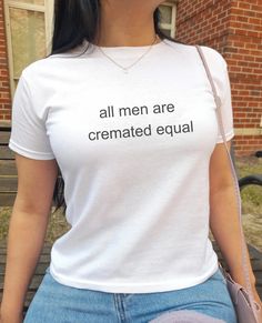 All Men Are Cremated Equal y2k baby tee 🌈 90s/00s/Y2K Baby Tees 🌈 🕒 Production & Shipping Times: 🕗 - Our t-shirts are made to order, so please allow 3-5 business days for production and an additional 4-8 days for shipping. 🎀 Care Instructions: 🎀 - To keep your t-shirt looking fresh, I recommend washing it inside out in cold water with similar colors. - Avoid bleach and tumble drying to preserve colors and graphics. - Hang dry or lay flat to dry for best results. 📌 Helpful Info: - Available in sizes XS to XL - Printed on a youth Gildan 5000b t-shirt  - Fits similar to the iconic 90s/00s baby tee style - Light colored shirts may be slightly see-through Please feel free to reach out with any questions or concerns! 🌟 that's hot 🌟 More t-shirts can be found here: http://2000sbabeclub.e 90s Fitted T-shirt With Funny Text, Fitted Short Sleeve Top With Funny Text, Fitted Crop Top T-shirt With Funny Text, Y2k Fitted Tops With Funny Text, Y2k Short Sleeve Crop Top With Funny Text, Funny Slogan T-shirt, Y2k Style Crop Top With Funny Text, 90s Style Fitted T-shirt With Funny Text, Funny Text Cotton Crop Top T-shirt