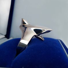 Thank you for visiting the SoChicFinds store - vintage and antique, costume and fine jewelry.  Shark ring.  This fish has a movable mouth. Brutalist ring is size: diameter 17,5mm (US- 7.25;  EU- 55). Metal: Rhodium plated alloy.  Cool jewelry for guys. Movable Mouth Shark Cool Ring, Silver Tone Predator Fish Ring Size 7, Brutalist Jewelry for Guys Brutalist Ring, Jewelry For Guys, Shark Ring, Brutalist Jewelry, Cool Ring, Fish Ring, Under Lock And Key, Ring Size 7, Ring Silver