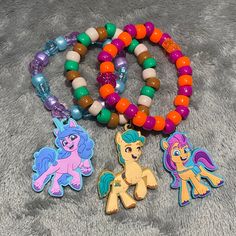 Bracelets measure between 28 and 30 beads and are strung together with stretchy string, and should fit almost any adult wrist. Pony Bead Animals, Bead Animals, Pony Bead Bracelets, Kandi Ideas, Kandi Bracelets, Kung Fu Panda, Bracelet Ideas, Beaded Animals, Bead Bracelets