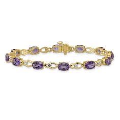 14K Two-tone Gold with rhodium over 14k yellow gold 9 cttw amethyst and diamond bracelet. Measures approximately 3/16 of an inch in width and has a box catch closure. Formal Fine Jewelry Diamond Bracelet With Birthstone, Classic Yellow Gold Bracelet With Gemstone, Classic Gold Bracelet With Birthstone, Formal Purple Fine Jewelry Bracelet, Yellow Gold Bracelet With Gemstone For Anniversary, Yellow Gold Gemstone Bracelet For Anniversary, Yellow Gold Gemstone Bracelets For Anniversary, Yellow Gold Amethyst Gemstone Bracelets, Yellow Gold Amethyst Bracelets With Gemstone