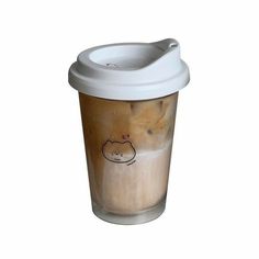 a coffee cup with a cat drawn on the side