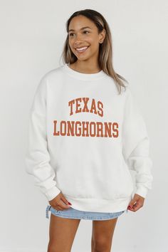 Stand out from the crowd in our Texas Longhorns premium fleece long sleeve sweatshirt. Boasting an oversized fit, crewneck and ribbed knit neckline, wrists, and waistband, it effortlessly blends comfort with fashion. Show your support for your favorite school or team in this irresistibly soft sweatshirt. Longhorn Sweatshirt, Madi Prewett, Sweatshirt Women, Texas Longhorns, Long Sleeve Sweatshirt, Long Sleeve Sweatshirts, Star Fashion, Drop Shoulder, All Star