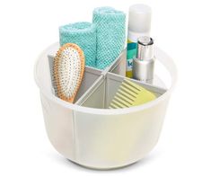 a white cup filled with lots of different types of toiletries and scrubs on top of each other