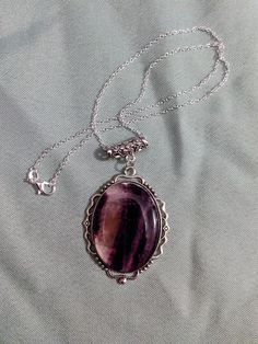 Amethyst pendant. Measurements approximate. Purple Necklace With Large Round Pendant, Purple Spiritual Necklace With Large Pendant, Spiritual Purple Necklace With Large Pendant, Purple Amethyst Oval Pendant Necklace, Purple Amethyst Necklace With Large Pendant, Purple Necklace With Large Pendant, Purple Pendant Necklace With Large Pendant, Amethyst Cabochon Necklace For Gift, Amethyst Necklace With Large Pendant For Healing