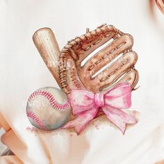 a baseball glove, ball and pink bow on a white shirt