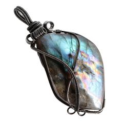 PRICES MAY VARY. Natural Labradorite Stone Necklace: Made ofnatural Labradorite and well polished each side, each of wrapped stone is varies in different hape,color, texture, and please kindly allow there are slight differents of the wires' place because of they are wrapped by hand. The pendant you receive is the most unique and will similar with the picture shown. Rainbow Labradorite Necklace: Labradorite appears blue, green, orange, red or other rainbow colors in the sun. Rotating the labrador Wire Wrapped Crystal Necklace, Wrapped Crystal Necklace, Mysterious Universe, Wire Wrapped Crystal, Geode Slice, Wrapped Crystal, Wire Wrapping Crystals, Labradorite Necklace, Stone Wrapping