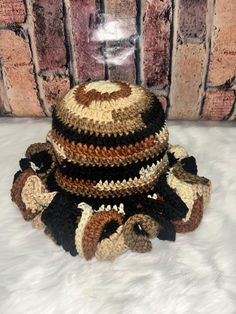 Handmade crochet beanie with ruffle brim. Brown Crochet Sun Hat For Spring, Bohemian Crochet Hat For Beach In Fall, Bohemian Crochet Beach Hat For Fall, Bohemian Brimmed Crochet Hat For Fall, Brown Crochet Knitted Hat For Spring, Brown Crochet Hat With Curved Brim For Fall, Spring One Size Brown Crochet Hat, Wide Brim Crochet Hat For Fall, Brown Hand Knitted Crochet Hat For Beach