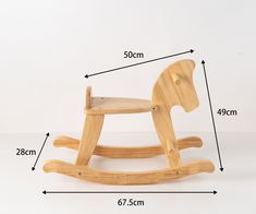 a wooden rocking horse with measurements for the seat and footrests, shown in front of a white background