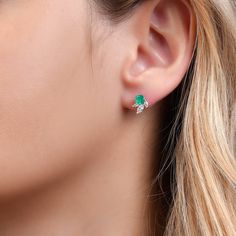 Step into the realm of classic luxury with the Stella Earrings. Great for everyday wear, or as a statement piece to add a touch of glamour to any outfit, these meticulously set emerald earrings are sure to be a timeless treasure. SKU BS30784E EMERALD SIZE 4.5mm COLORSTONE SHAPE Round COLORSTONE WT 0.55cts DIAMOND WT 0.34cts Ethically sourced emeralds directly from our renowned Belmont mine in Brazil. Elegant Green Diamond Earrings, Elegant Round Emerald Earrings, Elegant Green Diamond Earrings With Brilliant Cut, Elegant Emerald Earrings, Elegant Emerald Diamond Earrings, Elegant Emerald Diamond Earrings For Anniversary, Elegant Green Emerald Cut Diamond Earrings, Elegant Green Emerald-cut Diamond Earrings, Elegant Green Diamond Earrings In Prong Setting