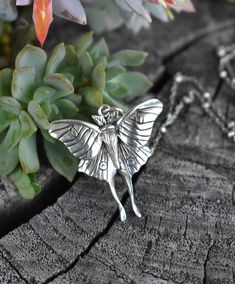 "Sterling Silver Luna Moth Necklace details: -Solid .925 sterling silver -Charm measures 28mm x 24mm -Three chain designs to choose from: Bead/Satellite Bead/or Oval Cable chain -Spring Ring clasp closure -Layers easily with other necklaces! Find our other necklaces here: https://www.etsy.com/shop/AWildViolet?ref=seller-platform-mcnav&section_id=35401315 Looking for a last minute or unique Christmas gift? Visit our \"READY TO SHIP\" section here, ships out in one business day https://www.ets Handmade Silver Butterfly Necklace, Sterling Silver Necklace With Butterfly Clasp For Gift, Fairy Style Sterling Silver Jewelry, Unique Silver Butterfly Necklace For Gift, Moth Accessories, Unique Sterling Silver Jewelry With Butterfly Charm, Unique Nickel Free Butterfly Necklace, Whimsical Silver Jewelry With Butterfly Charm, Unique Handmade Silver Butterfly Necklace