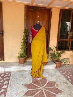 yellow buti georgette silk saree with hand embroidery Kalamkari blouse | silk saree with readymade blouse | sarees USA | pure light weight silk saree / red yellow saree with  stitched blouse / voggish / long sleeve maggam blouse      you are absolutely gonna fall in love with this unique modern  saree look with our stitched ready to wear blouses(includes the price) with a modern touch to them is perfect for your upcoming saree occassion that really makes you stand apart in crowd !!     You dont Yellow Semi-stitched Chanderi Pre-draped Saree, Yellow Pre-draped Saree With Resham Embroidery, Yellow Semi-stitched Cotton Silk Saree, Yellow Blouse With Zari Work For Navratri, Designer Yellow Blouse With Resham Embroidery, Yellow Blouse With Resham Embroidery For Navratri, Unstitched Yellow Blouse Piece For Diwali, Yellow Resham Embroidery Blouse For Navratri, Navratri Yellow Blouse With Resham Embroidery