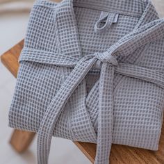 Wrap yourself in pure comfort and style with our personalized waffled cotton man's robe. Crafted from 100% cotton, this robe is the epitome of luxury and relaxation. Available in two sizes - S/M and L/XL - and offered in five serene color choices: white, gray, cream, blue, and green. Features: - Made from high-quality 100% cotton for a soft and breathable feel. - Stylish 3/4 sleeves for versatility and comfort. - Available in two sizes to ensure the perfect fit. - Choose from five soothing color Mens Robes, Embroidered Robe, Custom Robes, Embroidered Robes, Personalized Robe, Best Man Gift, Men's Robes, Groomsman Gift, Custom Embroidery