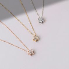 "If you don't want to, you don't have to leave spring behind. It may seem like spring all year long if you wear the right jewelry which is our Daisy Flower Necklace. F E A T U R E S * Made to Order. * Gold KT: 14K * Choice of Gold Color: Yellow Gold, Rose Gold, White Gold * Gem Stone: Genuine Diamond * Diamond-Cut: Round * Diamond Carat: 0.07 ct. * Pendant Height: 6 mm / 0.23 in * Pendant Width: 5 mm / 0.19 in * Diamond Color-Clarity: H Color, SI Clarity * Length: 14\", 16\", 18\", 20\", 22\" * Wedding Diamond Necklace With Clavicle Chain, Dainty Diamond Necklace With Single Diamond For Wedding, Flower Shaped Diamond Necklace For Wedding, Wedding Flower Diamond Necklace Fine Jewelry, Diamond Bridal Necklace With Clavicle Chain As Gift, Dainty Solitaire Necklace With Diamond Accents For Wedding, Delicate Flower Pendant Diamond Necklace For Wedding, Dainty Brilliant Cut Necklaces For Wedding, Wedding Necklaces With Brilliant Cut Flower