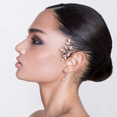 "This is a special single woodland ear cuff in the shape of a tree with branches and veined leaves. It is great to wear as a statement piece on a special occasion, and will definitely attract attention. It hugs the ear and can be easily adjusted. No piercing is needed to wear it! The wire that goes around the ear is firm but still flexible. so you can close it to fit around the ear firmly. It has an elegant matte finish. You have to choose which color 14k gold you want the ear cuff to be- yellow Branch Jewelry, Leaf Ear Cuffs, Elven Jewelry, Black Stud Earrings, Emerald Earrings Studs, Wrap Earrings, Bridal Fashion Jewelry, Silver Ear Cuff, Rustic Jewelry