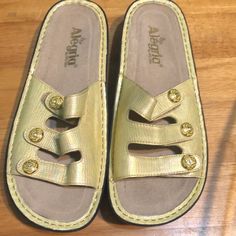 Great Condition No Stain Brand New Gold Open Toe Synthetic Slides, Gold Synthetic Open Toe Slides, Gold Open Toe Slides, Gold Synthetic Slide Sandals, Gold Round Toe Slides For Spring, Comfortable Gold Open Toe Sandals, Gold Casual Slip-on Slides, Gold Slides With Textured Footbed, Casual Gold Synthetic Slides