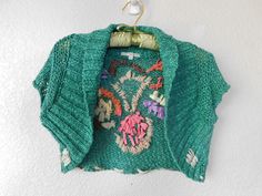 "Cute and vibrant look Knit copped bolero top Floral patterns Tape and yarn embellished Small beads Great condition Dimension - shoulder 13\" length 14.5\"" Green Bolero, Cotton Lace Tops, Bolero Top, Sheer Jacket, Sheer White Blouse, Fashion Network, Ivory Sweater, Small Beads, Different Dresses