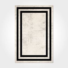 a black and white rug with an empty square in the middle on a gray background