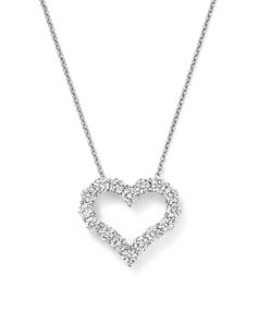 Sparkling diamonds set in 14K white gold create a sweet, heart shaped pendant necklace. Wardrobe Entrance, Heart Shaped Diamond Necklace, Diamond Bracelet Design, Diamond Heart Pendant Necklace, Heart Shaped Pendant Necklace, Heart Necklace Diamond, Heart Shaped Necklace, Gold Heart Necklace, Pretty Necklaces