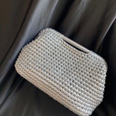 ----  Metallic Raffia Clutch Bag,Silver Evening Clutch,Large Silver Pouch Bag---- ---It's a special product made by sieving using all imported products.     A stylish and timeless accessory for daily use,special occasions,invitations and       evening.With its bright color,flashy style and stylish design, all eyes will be on you. ---It's all handmade. ---Satin lining. ---Different color options available. ----DIMENSIONS----    **   30cm x 19 cm x 13 cm(25cm Handle Frame)    **  12inchx 7.5inch x 5.1 inch (10 inch Handle Frame) ---Please contact me for different color and size options. ---Dry clean only recommended ! ---Handmade metallic clutch can also be a great gift for your loved ones.Birthday,Mother s Day,Christhmas,Anniversary,Hallowen,personalized gifts and gift for her. Please conta Silver Clutch Bags With Silver-tone Hardware, Silver Evening Bag With Top Handle And Silver-tone Hardware, Silver Evening Bag With Silver-tone Hardware, Silver Top Handle Evening Bag For Wedding, Silver Pouch Shoulder Bag For Party, Silver Handheld Shoulder Bag With Silver-tone Hardware, Silver Top Handle Clutch For Party, Silver Top Handle Evening Bag For Party, Silver Top Handle Clutch For Formal Occasions