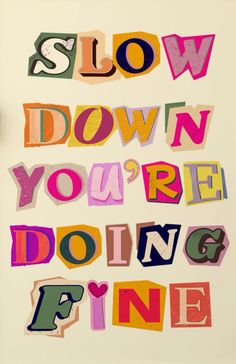 the words slow down, you're doing fine written in multicolored letters