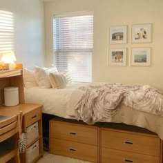 a bed sitting in a bedroom next to a wooden dresser and window with blind shades on it